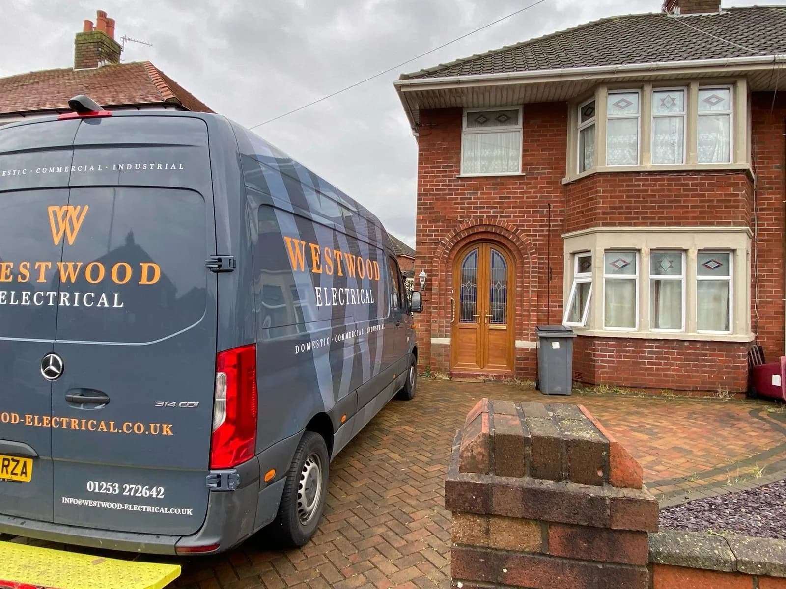 Westwood Electrical van outside a residential property